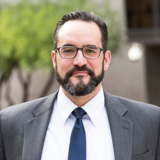 Aaron J Shnider